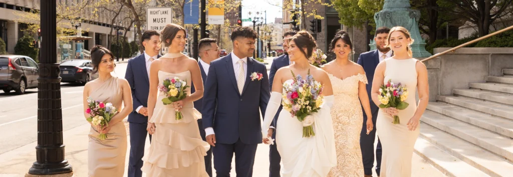 wedding makeup bridal party members walking down the street in milwaukee